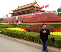 Striking a pose in front of the Gate of Heavenly Peace // © 2012 Gary Bowerman