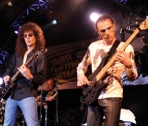 Guitar virtuoso Patrick Rondat (left) with his band // © 2010 Noemeye_square1