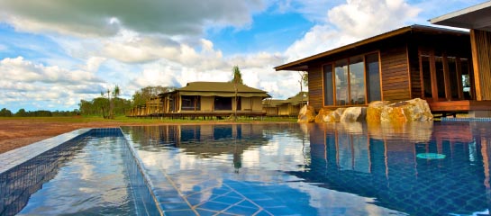 The resort’s infinitly pool blends into the landscape. // © 2011 Wildman Wilderness Lodge F