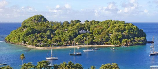 The beauty of Young Island attracts celebrities and foodies. // © 2012 Young Island Resort F