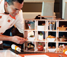 Newly added dining experience, Qsine, takes clients on a culinary journey onboard the Summit. // © 2013 Celebrity Cruises
