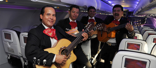 Mexican musicians performing on the inaugural nonstop flight from San Francisco to Puerto Vallarta // © 2011 Virgin America F