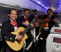 Mexican musicians performing on the inaugural nonstop flight from San Francisco to Puerto Vallarta // © 2011 Virgin America