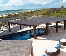 The Hotel Eco Paraiso Xixim is set on miles of open beach. // © 2011 Yo Noguchi
