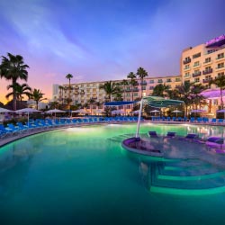 Property features include two pools, a swim-up bar and a kids’ pool. // © 2013 Hard Rock Hotels