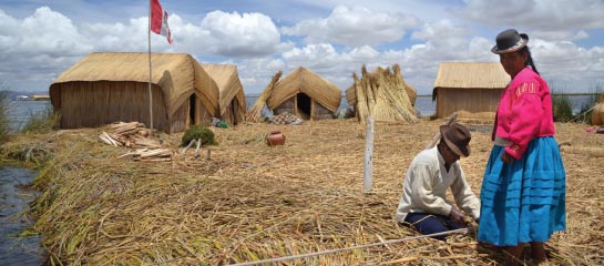 The Uros people live a traditional lifestyle on their floating islands. // © 2011 Janeen Christoff F