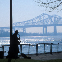 A quiet walk along the Mississippi River is just one of the romantic things to do in New Orleans // © 2013 Alex Demyan and NewOrleansOnline.com