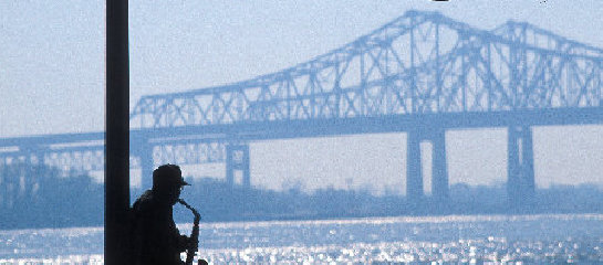 A quiet walk along the Mississippi River is just one of the romantic things to do in New Orleans // © 2013 Alex Demyan and NewOrleansOnline.com F