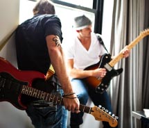 Guests receive complimentary guitar room service with a choice of 20 guitars.// © 2012 Hard Rock Hotels & Casinos
