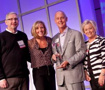 Travelink accepts American Express’ award for Travel Agency of the Year. // © 2011