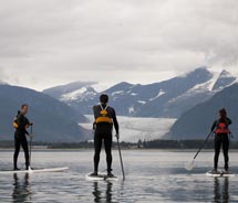 Visitors can try stand-up paddleboarding in Alaska with Blue Nose Surf // © 2012 Blue Nose Surf