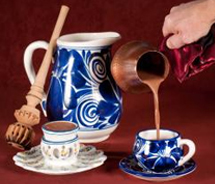 The New World Cuisine exhibit includes many artifacts related to chocolate, including this porcelain saucer, called a mancerina. // © 2012 The Museum of International Folk Art