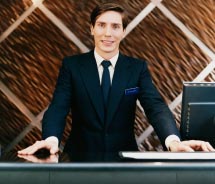 Experts advise that travel agents get to know hotel staff. // © 2012 Thinkstock