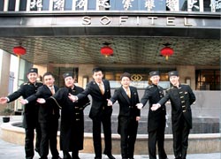 Li (center) with his concierge staff // (C) 2010 Sonesta Maho