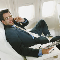 Americans say no to cell phones on planes // (c) 2013 Thinkstock